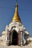 Myanmar - Sagaing, Shwe-kyet-kay a pagoda on a steep bank of the River close to the two parallel bridges linking Sagaing and Amarapura. 